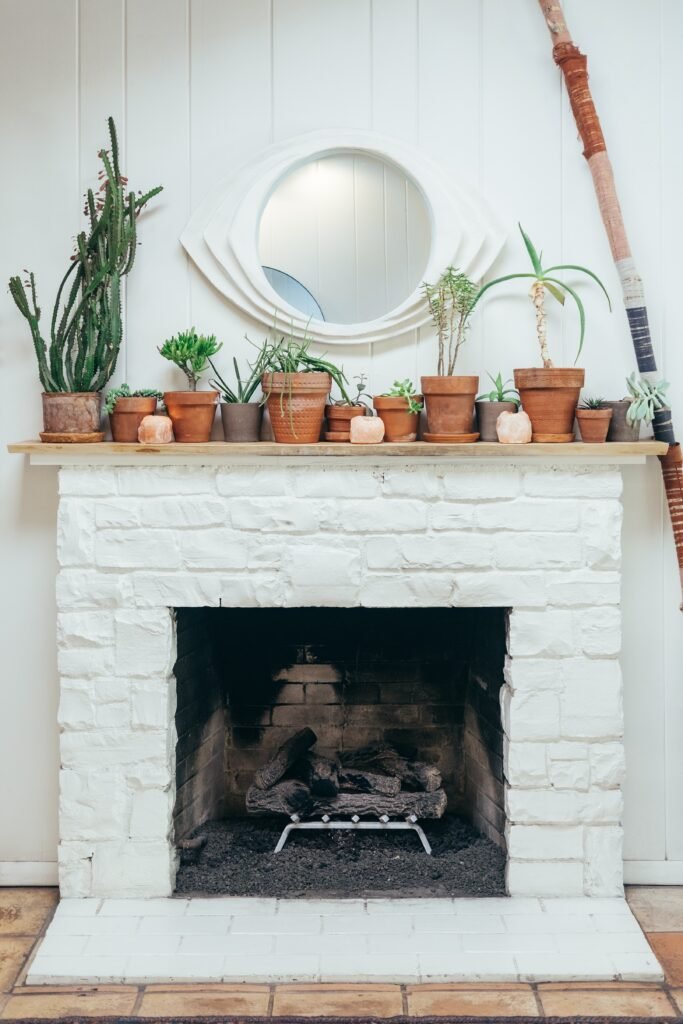 how to decorate a niche above fireplace